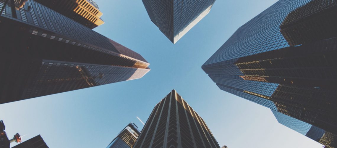 blue and black city buildings photography